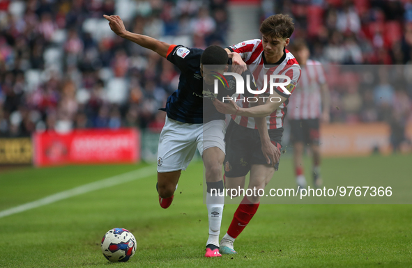 Sunderland's Edouard Michut challanges Luton Town's Cody Drameh during the Sky Bet Championship match between Sunderland and Luton Town at t...