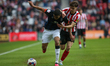 Sunderland's Edouard Michut challanges Luton Town's Cody Drameh during the Sky Bet Champio...