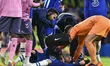 Christian Pulisic of Chelsea receives treatment during the Premier League match between Ch...