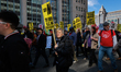 Demonstrators march in Washington, D.C. on March 18, 2023 during an anti-war protest organ...