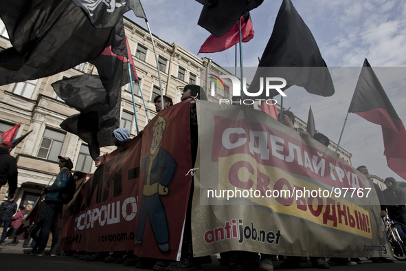 Russian leftists parade during May Day celebrations in Saint Petersburg, Russia, on May 1, 2014. 