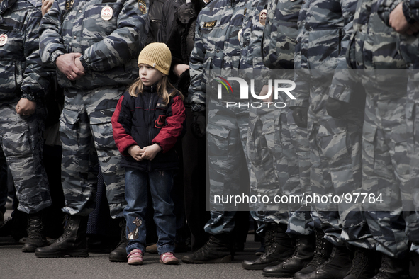 A girl during Russian leftists parade during May Day celebrations in Saint Petersburg, Russia, on May 1, 2014. 