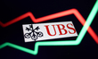 An illustrative stock chart and UBS logo displayed on a phone screen are seen in this mult...