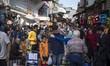 An Iranian family shop from a vendor at a local outdoor bazaar (Market) in the city of Ras...