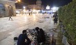 An Iranian family brake their fast after an evening mass prayer ceremony in a holy shrine...