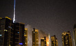 Flames rip through the Address Downtown hotel after it was hit by a massive fire, near the...