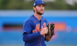 New York Mets minor leaguer Tanner Murphy (43) comes off field during a Spring Training ba...