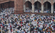 Muslim devotees offer First Friday prayers at Jama Masjid on the first day of the holy mon...