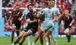 Luke Northmore of Harlequins   holds of Sean Maitland of Saracens during the Gallagher Pre...
