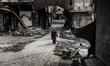 Aleppo, Syria, 2012-10-23, Old City District.
An elderly woman, smiling, cross the street...