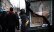 ''Touch your balls but don't touch our pensions'', says the writing left on a destroyed ro...