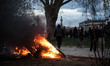 A fire set up at Place de la Nation, the ending point of the rally against pension reform,...
