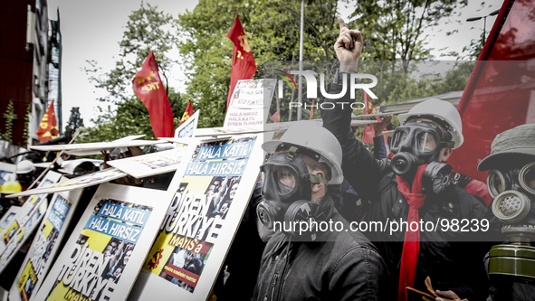 (Largest File Version) - Turkish protestors during clashes with riot police who prevent demonstrators from reaching Taksim Square in Istanbu...