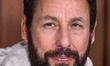 American comedian, actor, screenwriter, producer, singer and musician Adam Sandler arrives...