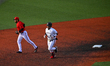 Cincinnati infielder, JP Sponseller, is seen rounding second base after getting a hit duri...