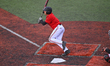 Louisville infielder, Christian Knapczyk, is seen during a college baseball game between t...