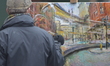 The artist Rob Pointon painting an imaginative scene on the corner of Oxford Road and Port...