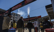 Fireworks are set off as people arrive at Nationals Park stadium in Washington, D.C. on Ma...
