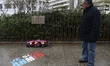 A passer-by stops for a short time in front of the commemorative plaque in memory of the F...