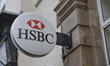 Light shining on a HSBC sign in Stockport on Tuesday 5th January 2016. Multi-national bank...