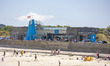Daily life at the sea during a blue sky day at Pembroke beach with many locals and tourist...