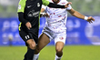 Yazan Abdallah Alnaimat (L) of Al Ahli SC and Abdel Aziz Mitwali (R) of Al Shamal SC battl...