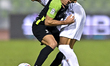 Shojae Khalilzadeh (R) of Al Ahli SC and Yacine Bammou (L) of Al Shamal SC battle for the...