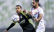 Jasem Mohamed Omer (L) of Al Ahli SC and Ali Iyad Olwan (R) of Al Shamal SC battle for the...