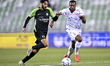 Yazan Abdallah Alnaimat (L)  of Al Ahli SC and Landre Loick (R) of Al Shamal SC battle for...