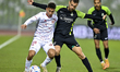 Aldoukali Al-baoure (R) of Al Ahli SC and Omar Mohamed (L) of Al Shamal SC battle for the...