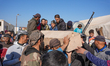 The funeral of a displaced Palestinian youth from the Yarmouk camp in Damascus?In Deir Bal...