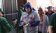 The New York Mets fans enter gates prior to the baseball game against the Miami Marlins at...