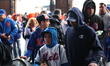 The New York Mets fans enter gates prior to the baseball game against the Miami Marlins at...