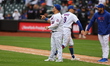 The New York Mets celebrate after their 9-3 win against the Miami Marlins at Citi Field in...