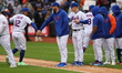 The New York Mets celebrate after their 9-3 win against the Miami Marlins at Citi Field in...