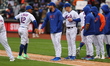 The New York Mets celebrate after their 9-3 win against the Miami Marlins at Citi Field in...