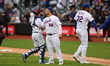 The New York Mets celebrate after their 9-3 win against the Miami Marlins at Citi Field in...