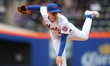 New York Mets starting pitcher Brooks Raley (25) throws during the eighth inning of a base...
