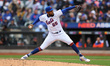 New York Mets relief pitcher Dennis Santana (65) throws during the eighth inning of a base...