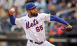 New York Mets relief pitcher Dennis Santana (65) throws during the eighth inning of a base...