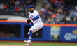 New York Mets relief pitcher Dennis Santana (65) throws during the eighth inning of a base...