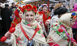 Ukrainian children wearing traditional dresses sing Christmas carols at the "Procession of...