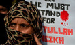 An Indian shiite muslim woman protests against Saudi Arabian Govt. for executing Shia clee...