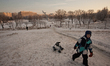 People promenade in Aviators Park, St Petersburg, Russia, on January 8, 2016. The temperat...