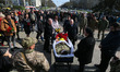 (EDITOR'S NOTE: Image depicts death) Ukrainians take part at a farewell ceremony with Ukra...