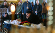 (EDITOR'S NOTE: Image depicts death) Relatives react during a farewell ceremony with Ukrai...