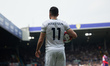 Jack Harrison of Leeds United takes the ball under his arm during the Premier League match...