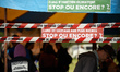 Signs reading '5 years of Climate inaction stop or again ?' The collectives 'La Voie Est L...