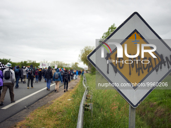 A sign reads 'No macadam'. More than 8000 protesters marched 12km against the planned A69 highway. The collectives 'La Voie Est Libre' (ie '...
