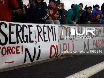 A banner reads 'To Serge, Remi, Zyed, Bouna, Cedric, Steve, no forgetting no forgiveness'.   More than 8000 protesters marched 12km against...